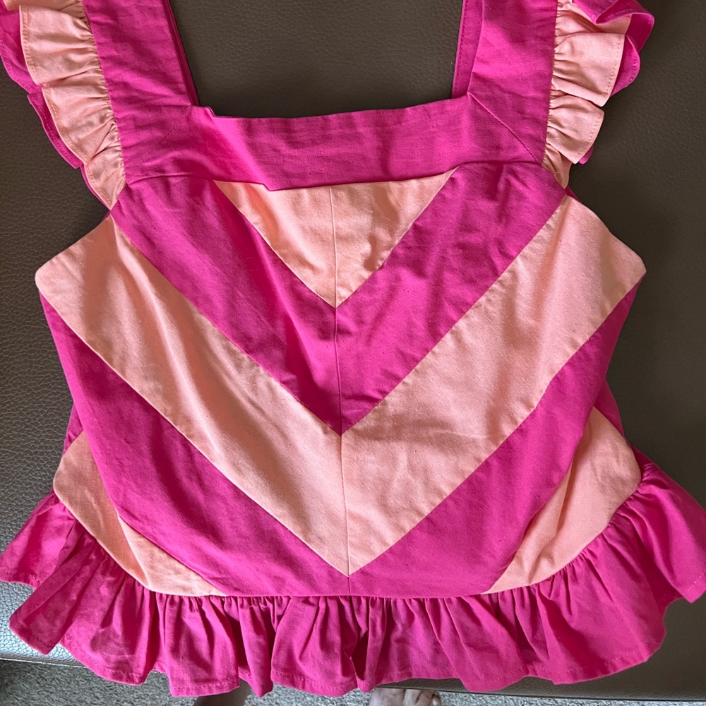 Anthropologie Entro cropped peplum top size L with smocked back.